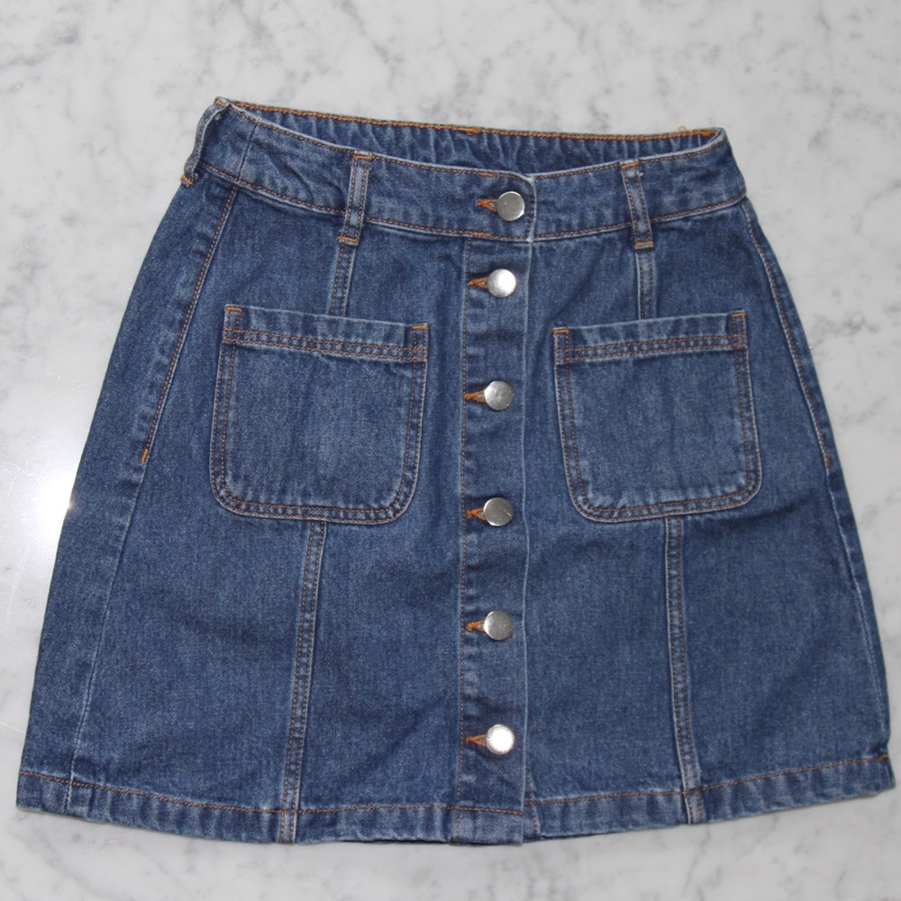 H&M denim skirt with silver buttons.
